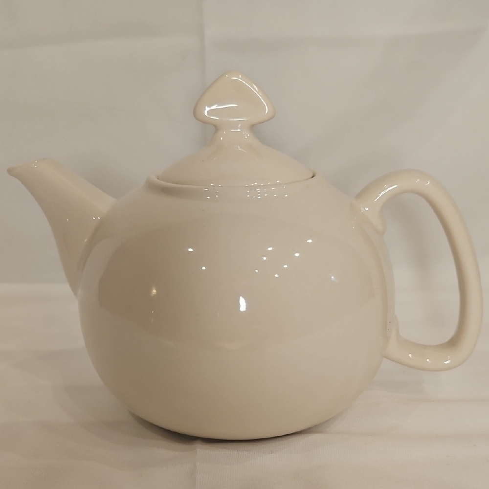 Elegant Cream Teapot